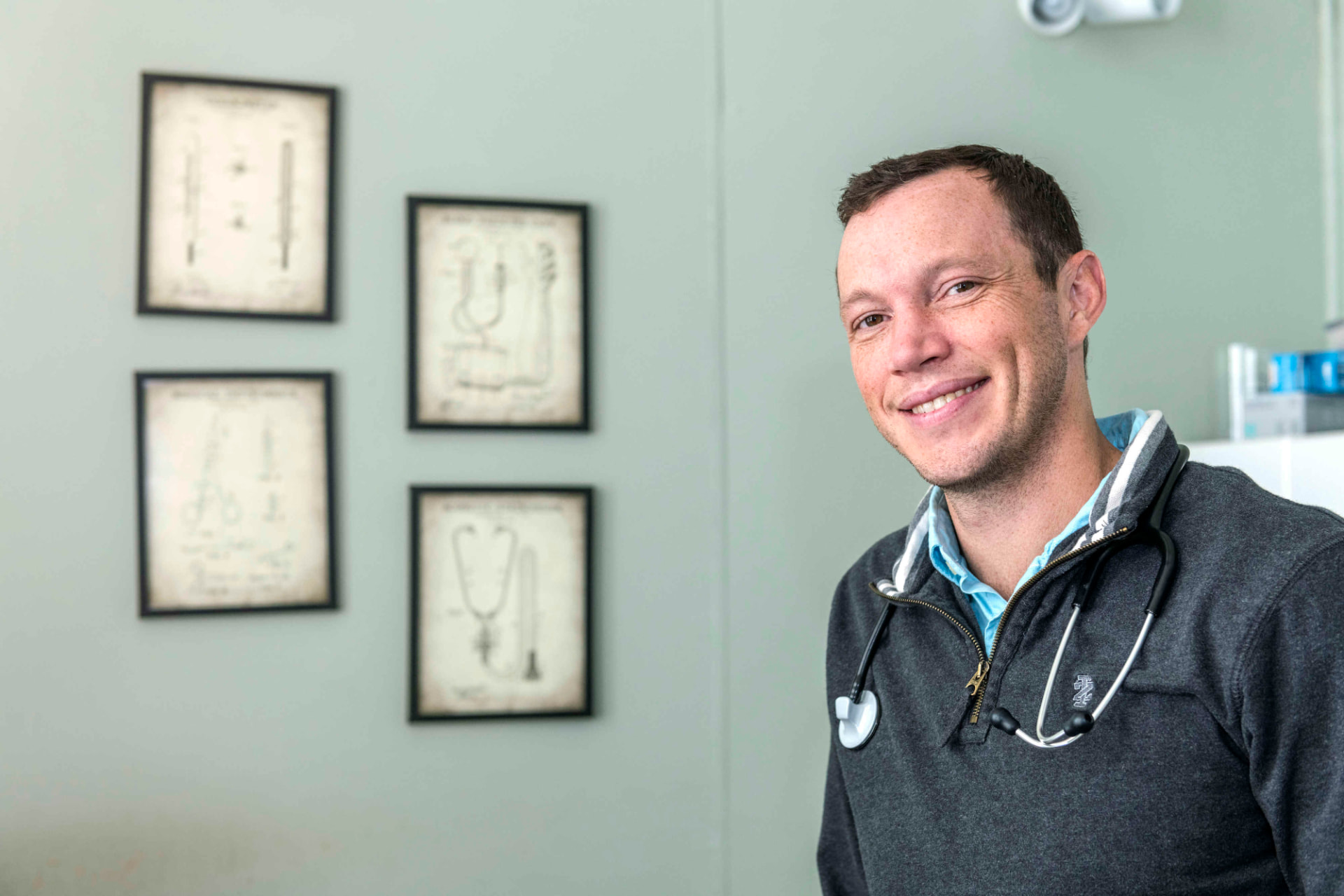 James Chandler of Square 1 Healthcare smiling in his Champaign County clinic